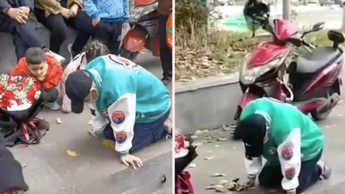 Genç adam, 21 saat boyunca yağmur altında diz çökerek kız arkadaşından af diledi